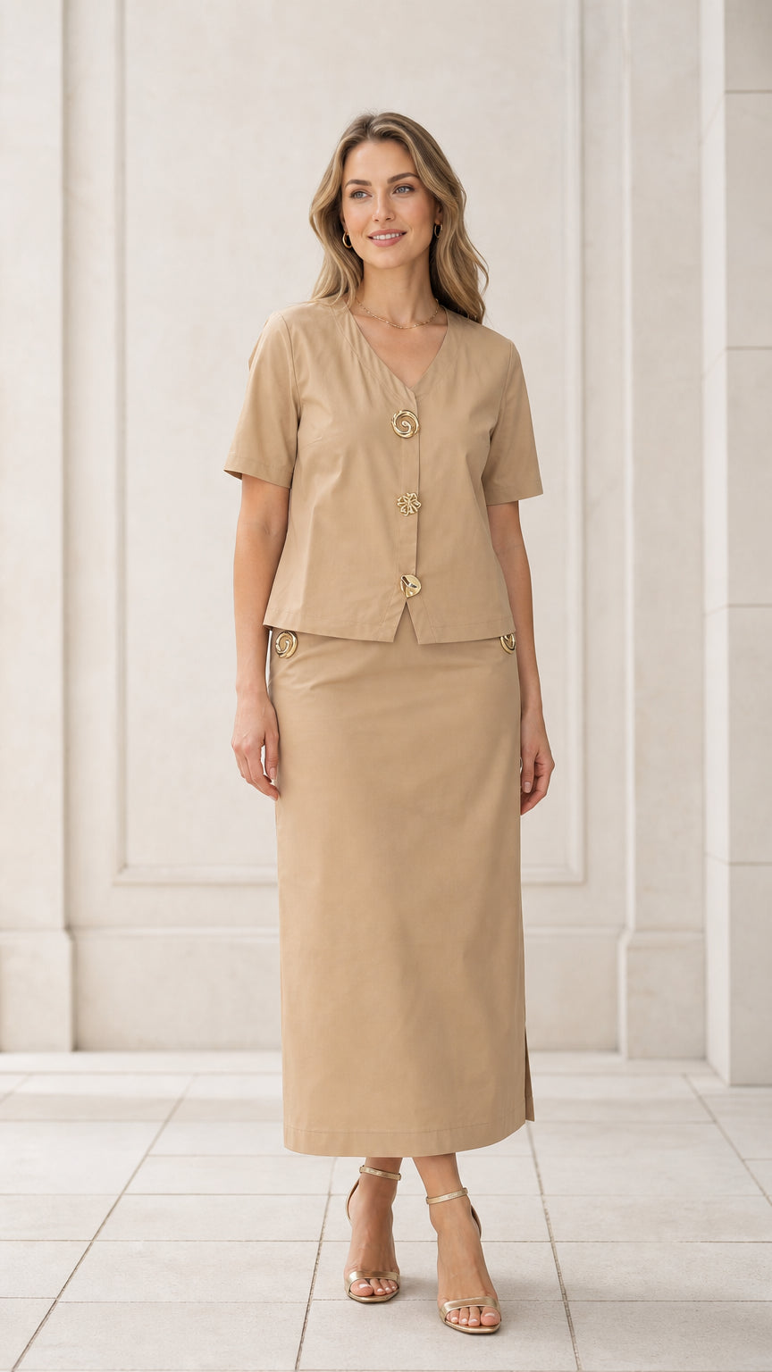 Front full view of woman wearing khaki short sleeve V-neck blouse and column maxi skirt set with gold buttons