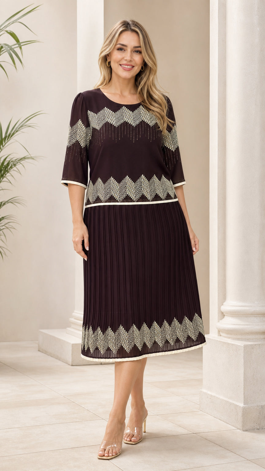 Chocolate brown geometric pleated midi dress shown from the front