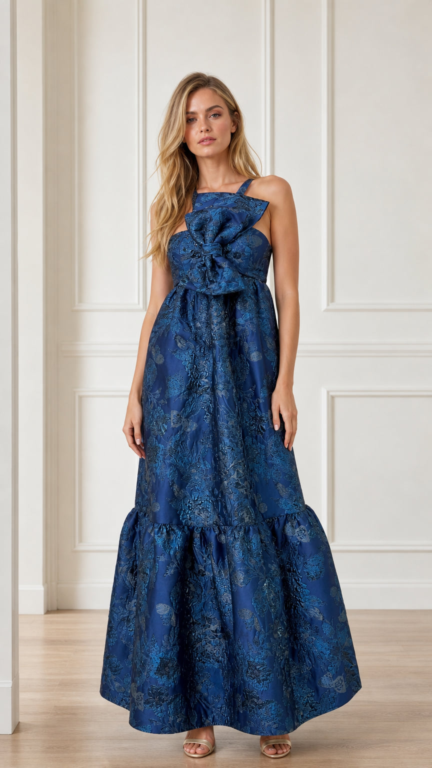 Front view of blue sleeveless brocade maxi dress with front bow