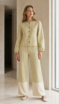 Front view of woman wearing sage striped matching set