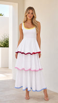 Front view of model wearing white contrast trim tiered maxi dress