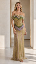 Front view of model wearing gold off-shoulder beaded evening gown