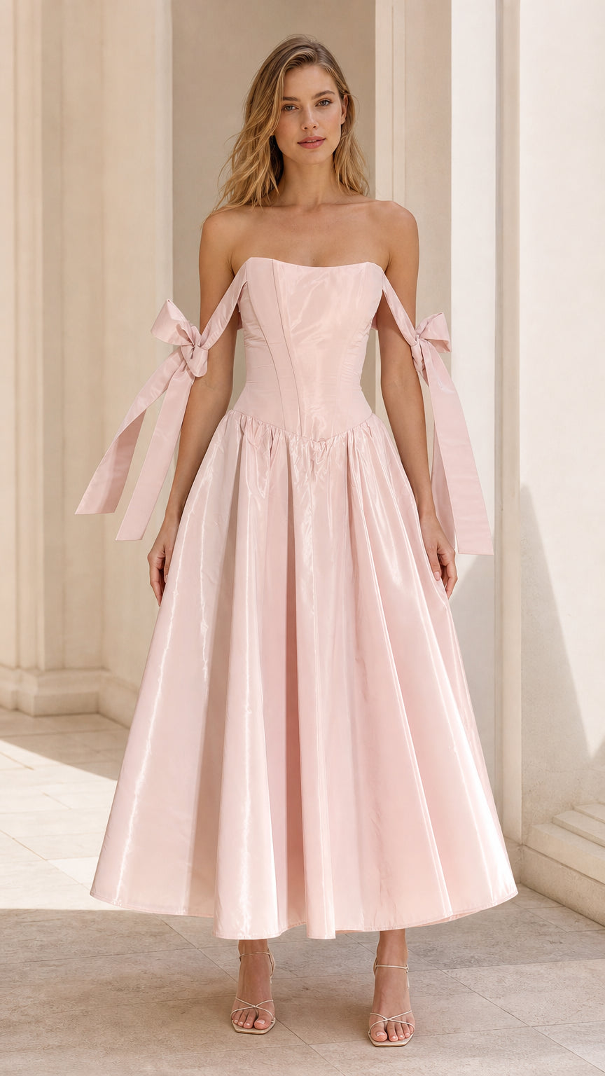Model wearing Blush Pink off-shoulder corset midi dress with ribbon ties front view