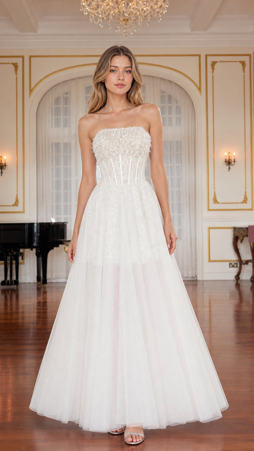 Front view of model wearing white strapless corset tulle A-line gown