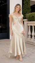 Front view of model wearing Champagne satin maxi dress with floral embroidery and ruffles