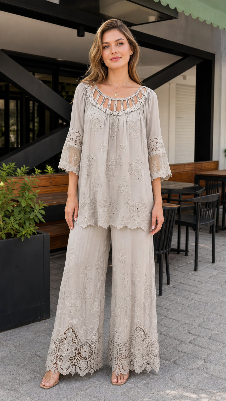 Front view of model wearing light grey crochet trim tunic and matching wide leg pants