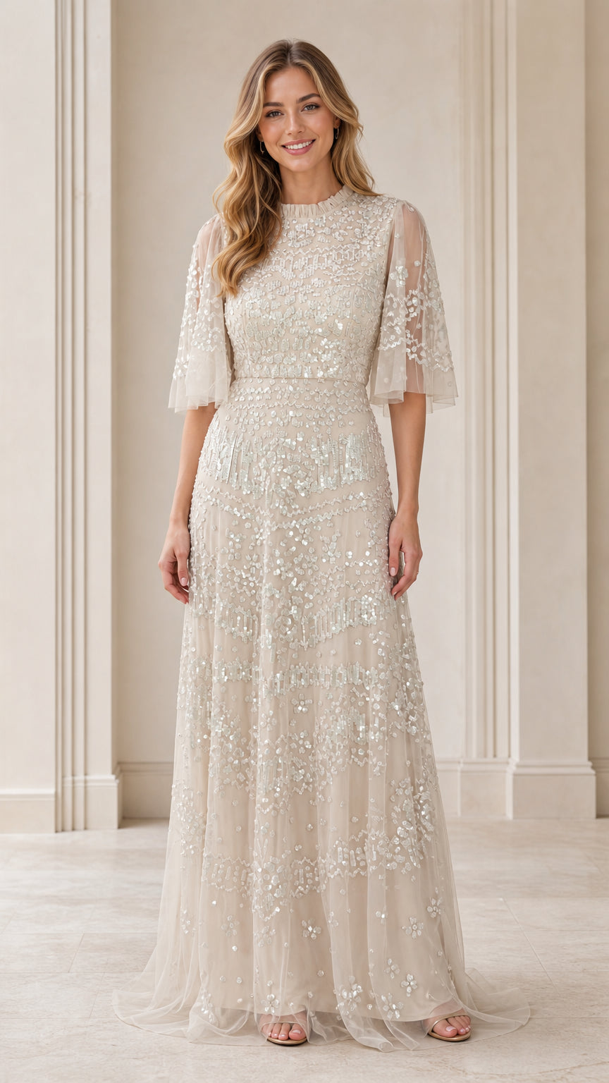Front view of model wearing champagne sequin formal evening dress