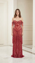 Model wearing red off-shoulder beaded evening gown, front view