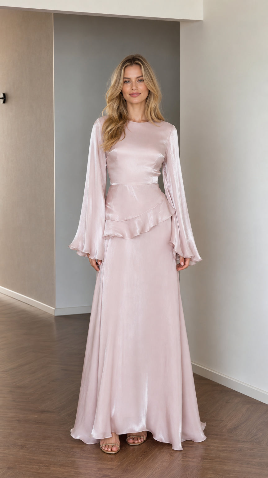 Front view of model wearing pink satin long sleeve maxi dress