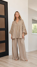 Full front view of camel striped shirt and pants set