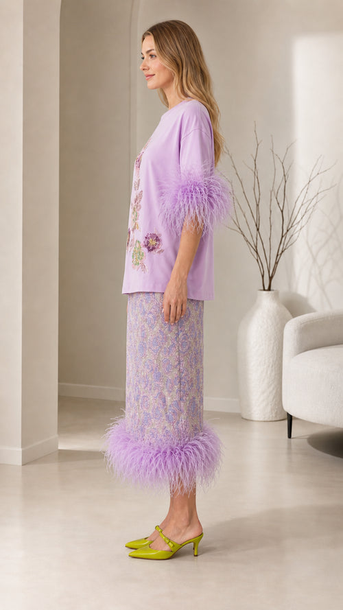 Side profile view of lavender feather trim co-ord set