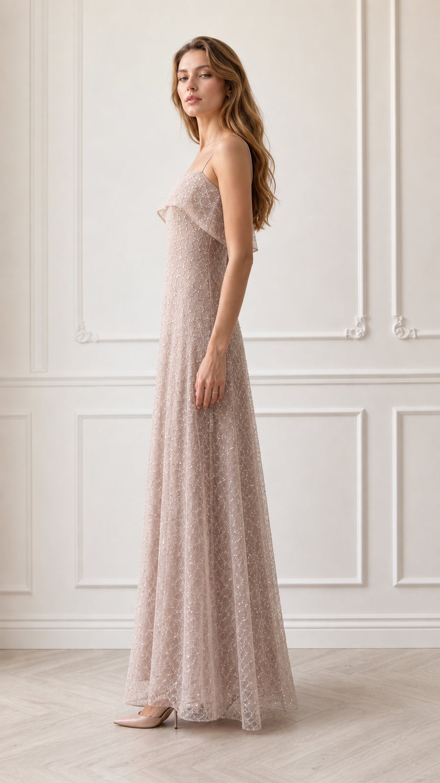 Side angle of model wearing dusty rose sequined lace A-line evening gown