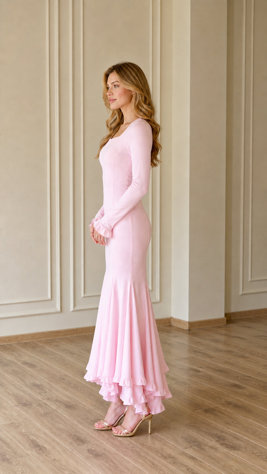 Blush pink trumpet maxi dress side view showing fitted silhouette
