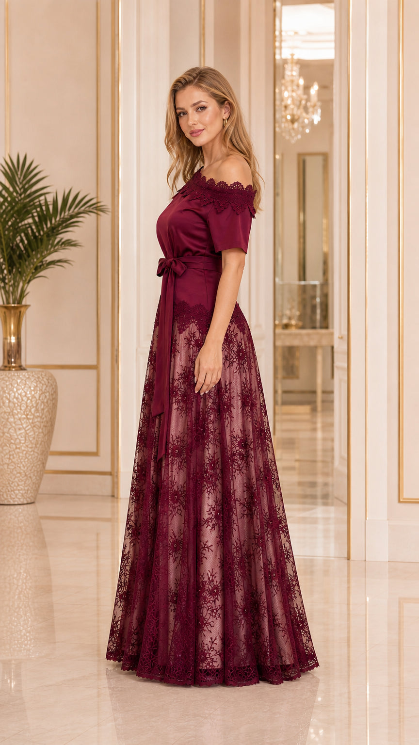 Model wearing wine burgundy lace maxi formal dress side view