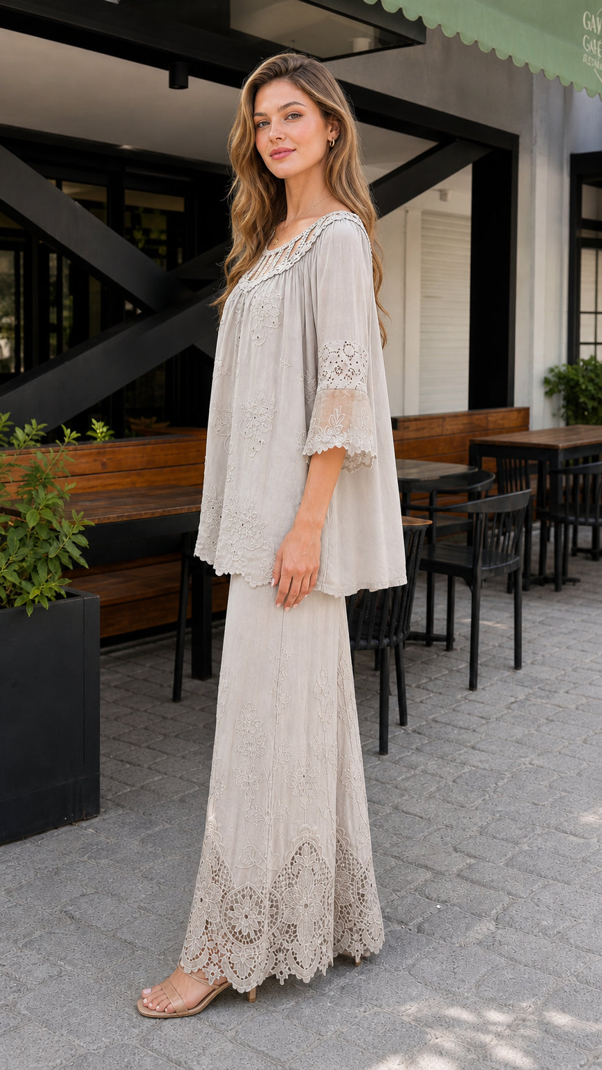 Side profile of model in light grey two-piece set