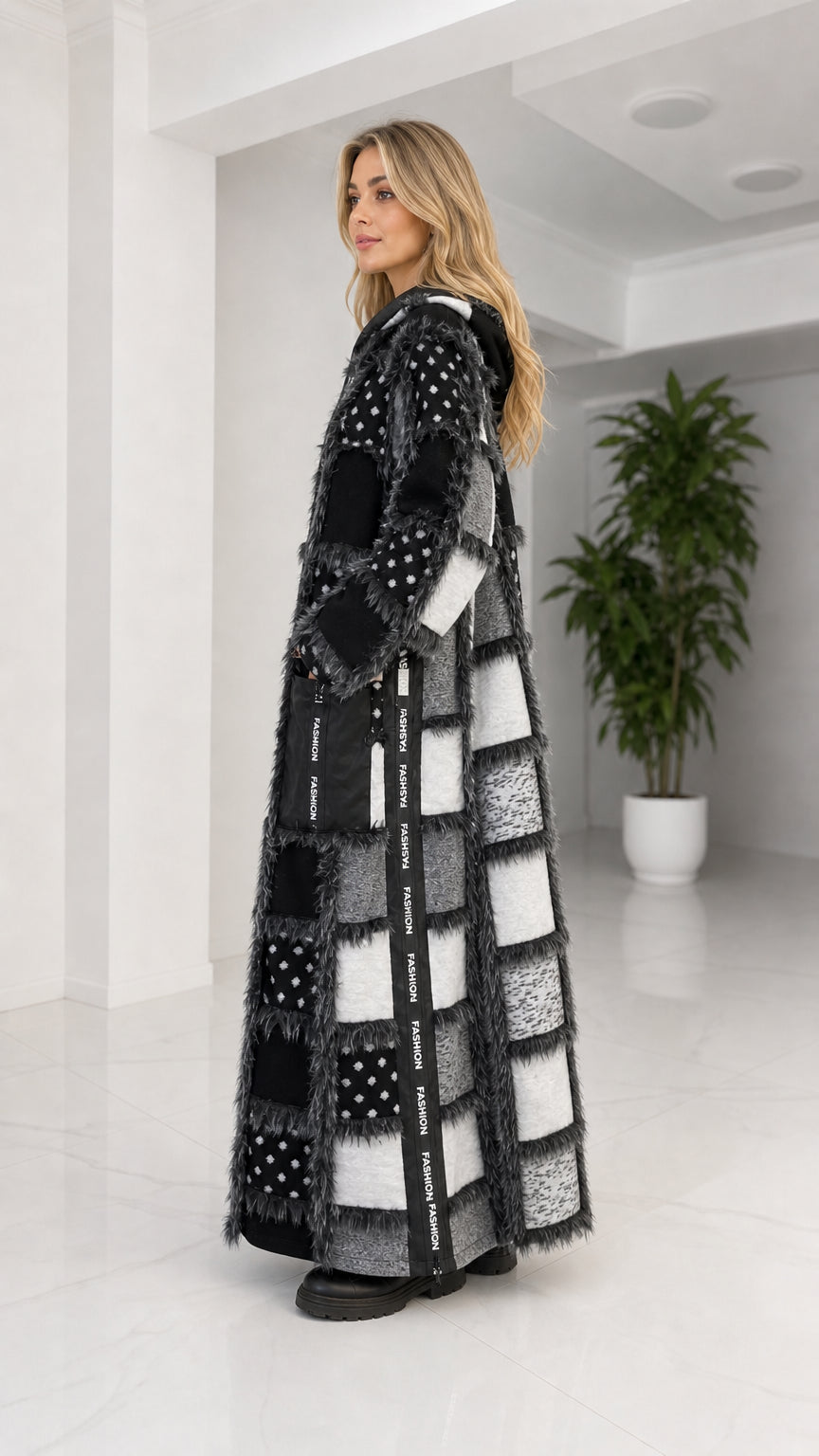 Side profile view of black patchwork faux fur long coat