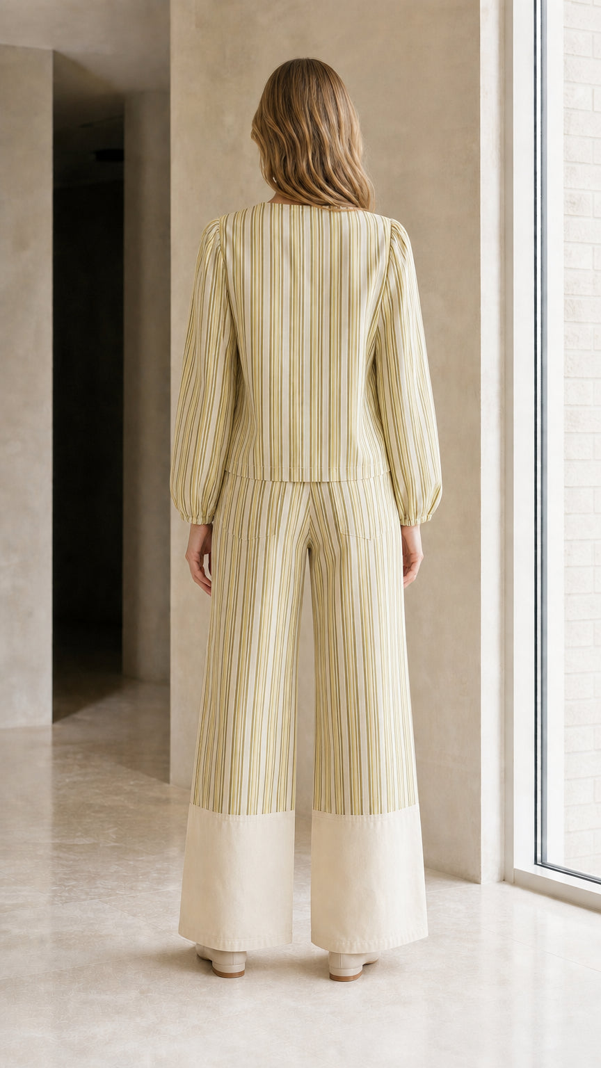 Back view of woman wearing sage striped matching set