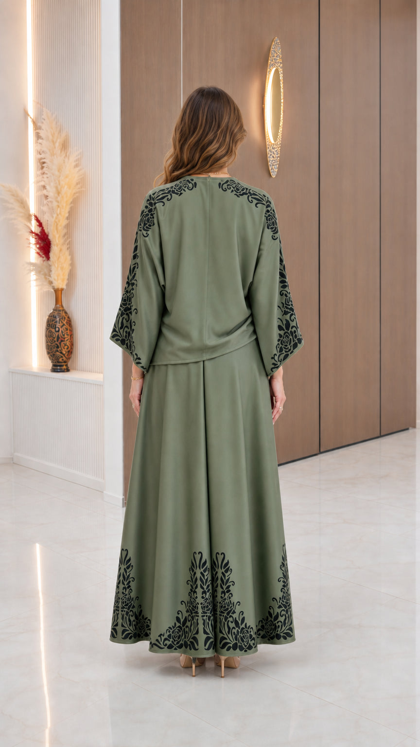 Back view of model wearing Sage Green modest maxi skirt set showing relaxed drape