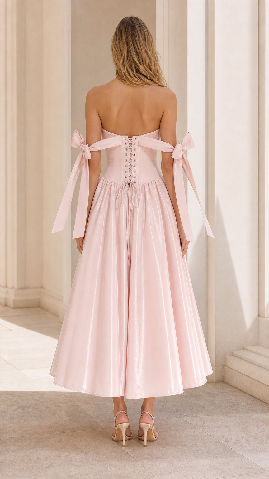 Back view of Blush Pink midi dress highlighting adjustable lace-up corset closure