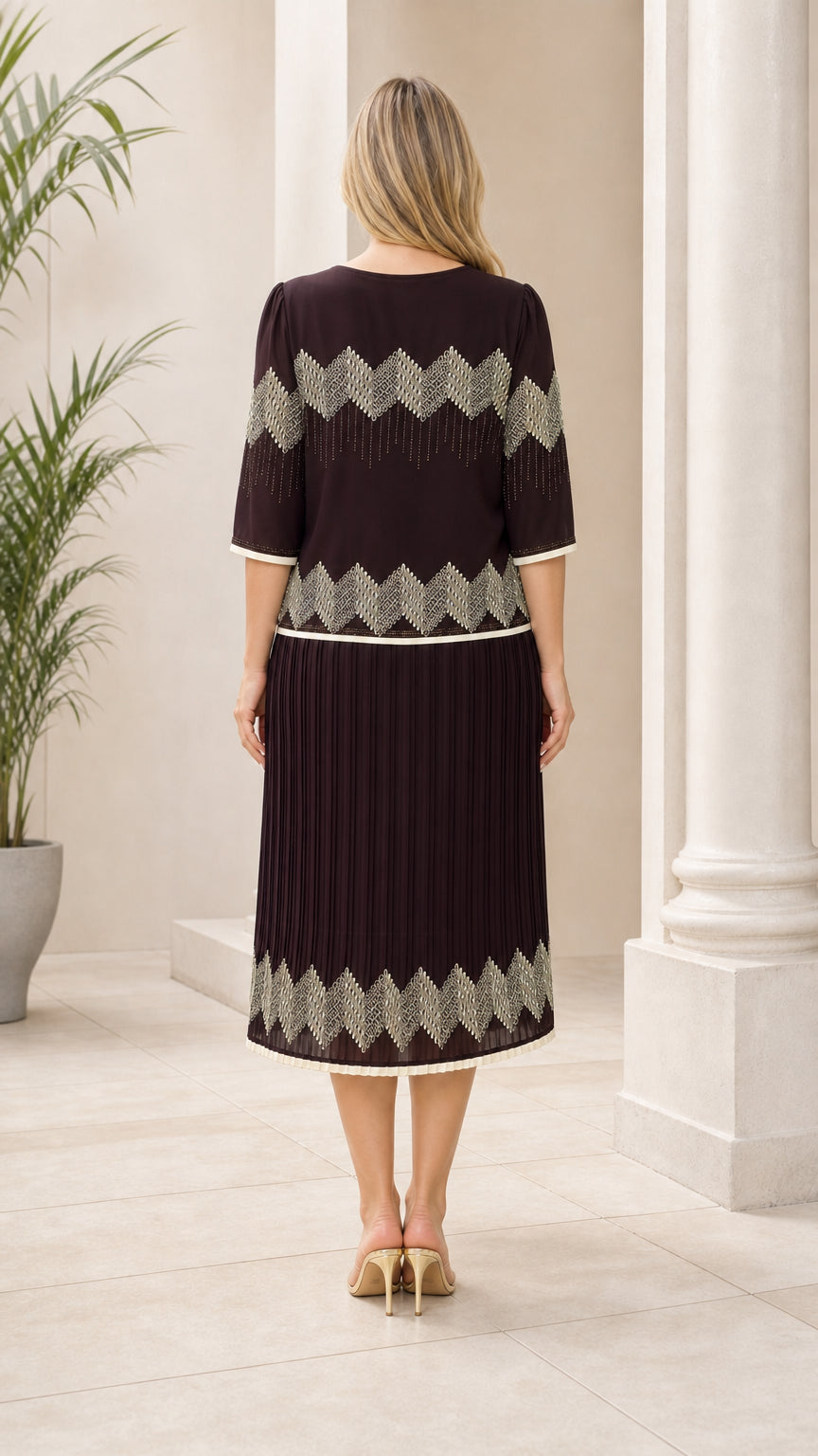 Chocolate brown pleated midi dress shown from the back