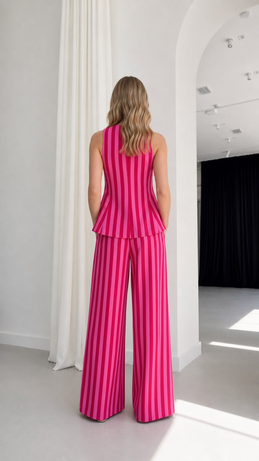 Model wearing hot pink striped set back view