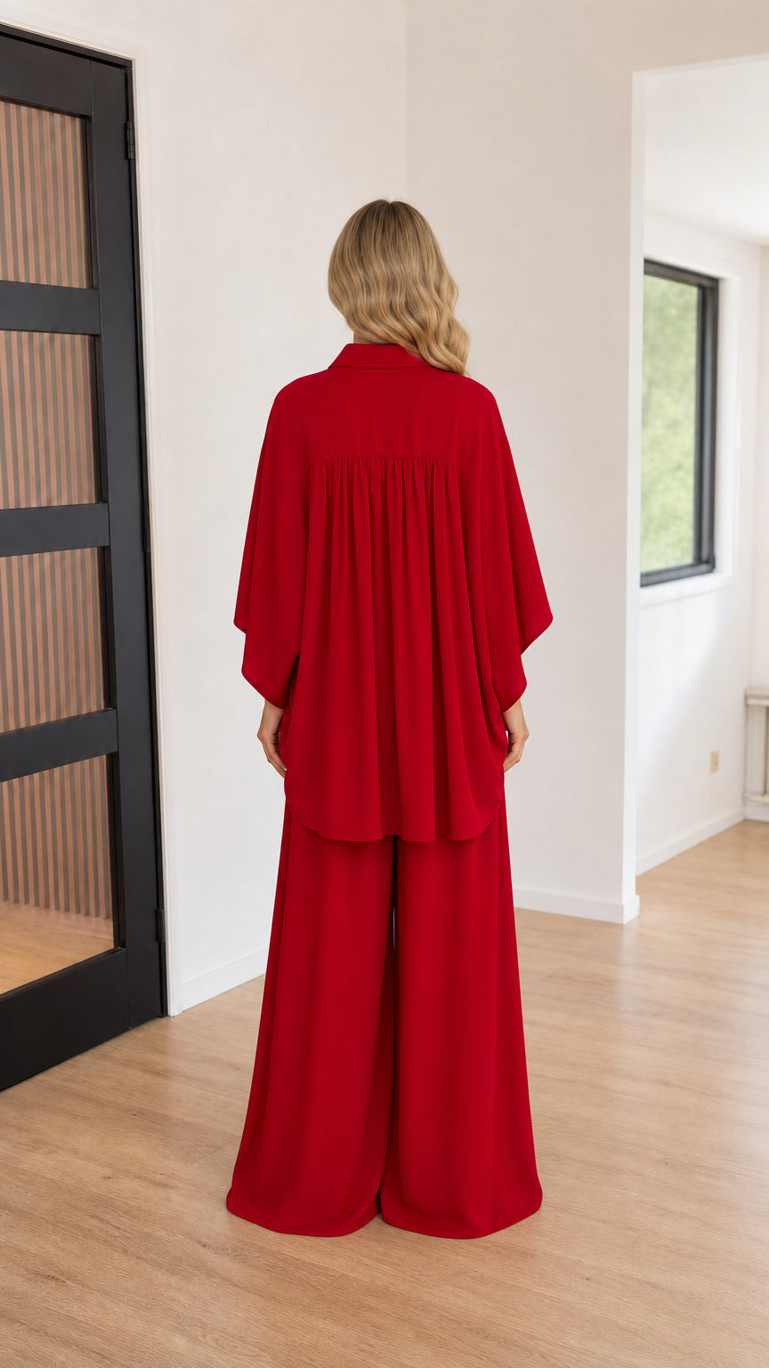Back view of red women's collared top and wide-leg pants set