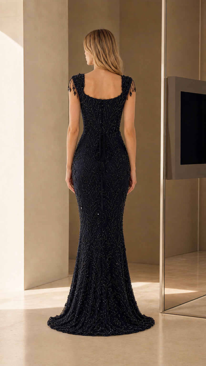 Back view of Navy beaded evening gown
