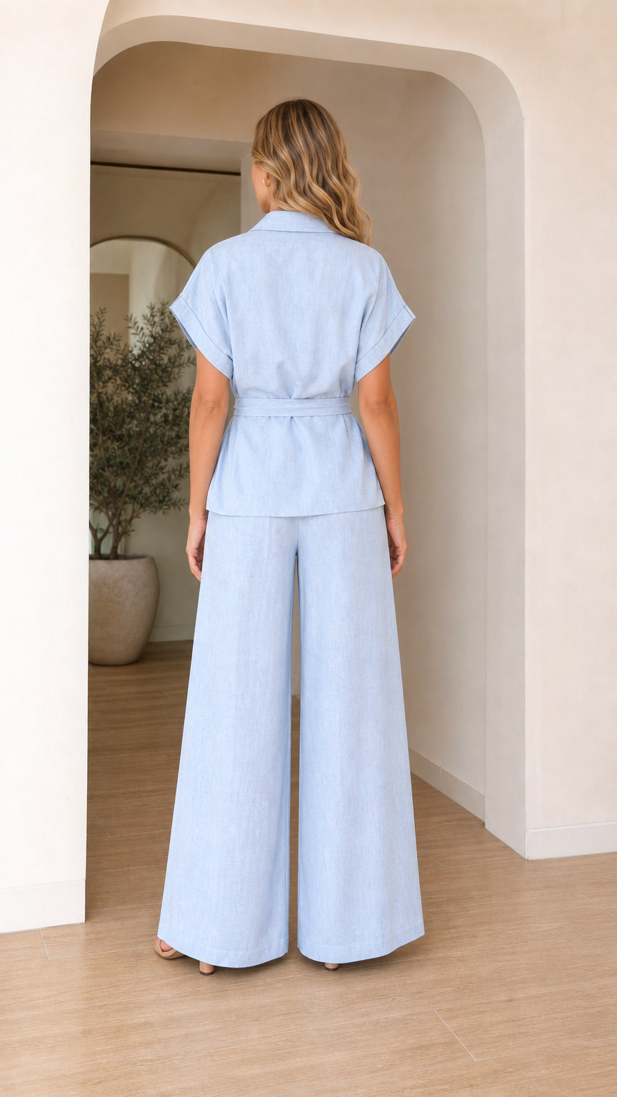 Back view of light blue pants and top set