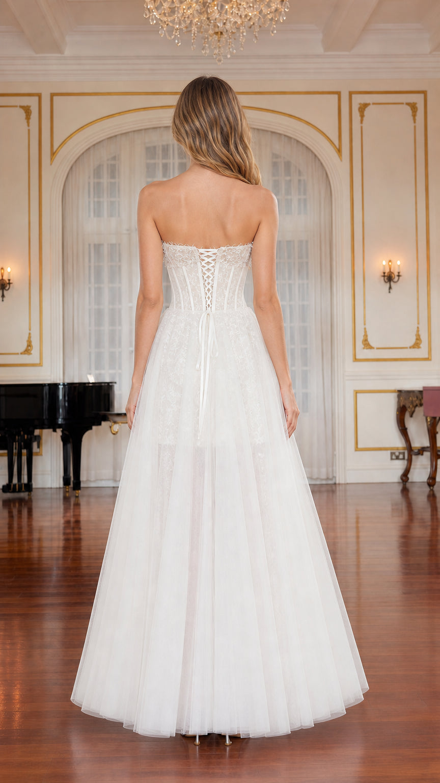 Back view of white gown highlighting adjustable lace-up corset back
