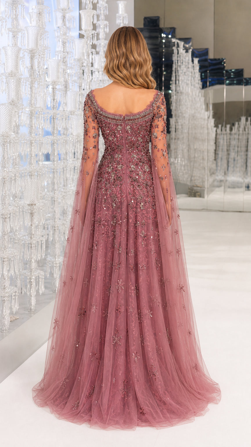 Back view of Dusty Rose gown featuring flowing cape detail