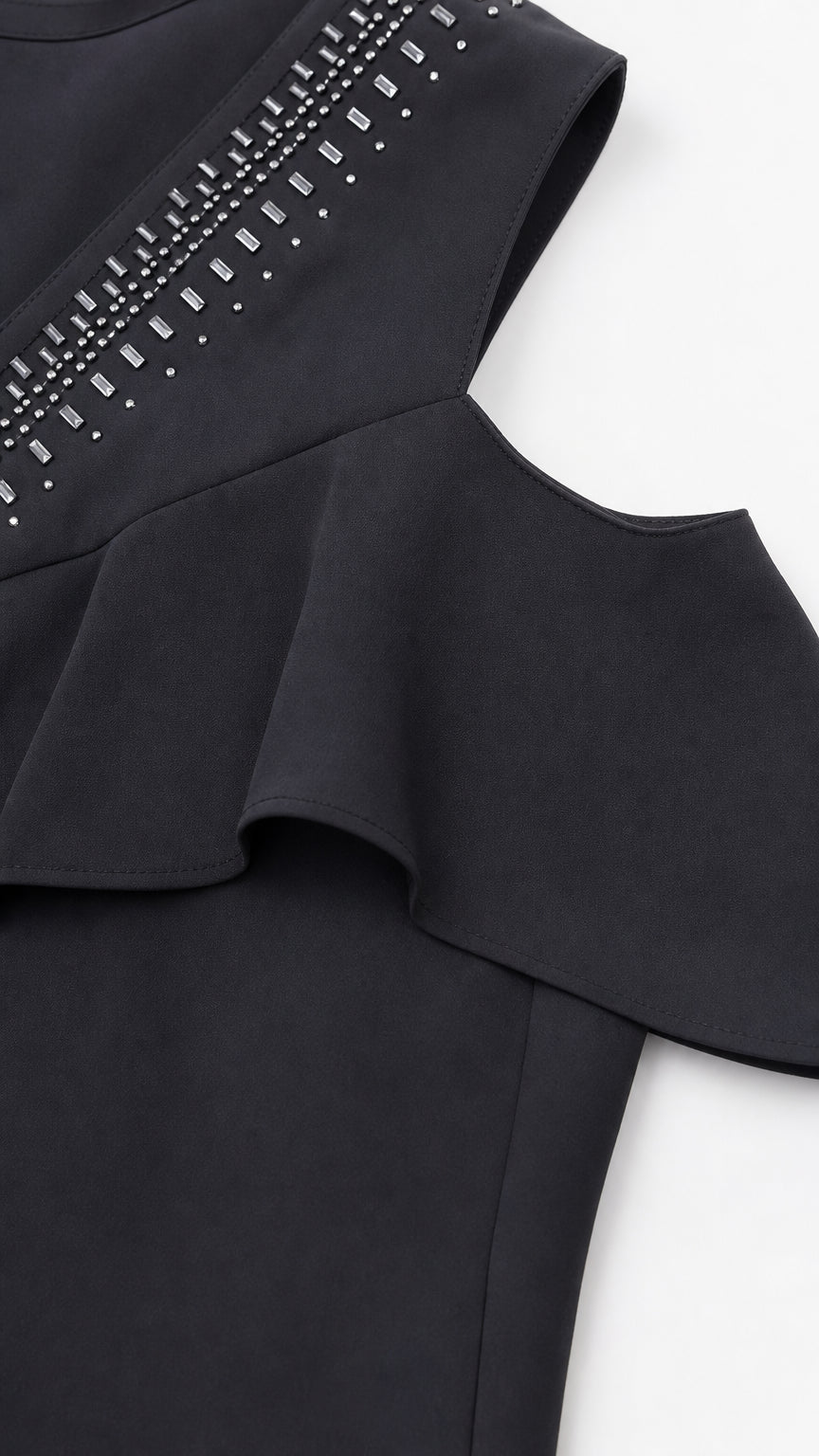 Close-up of rhinestone embellished V-neckline and flutter cold-shoulder sleeve