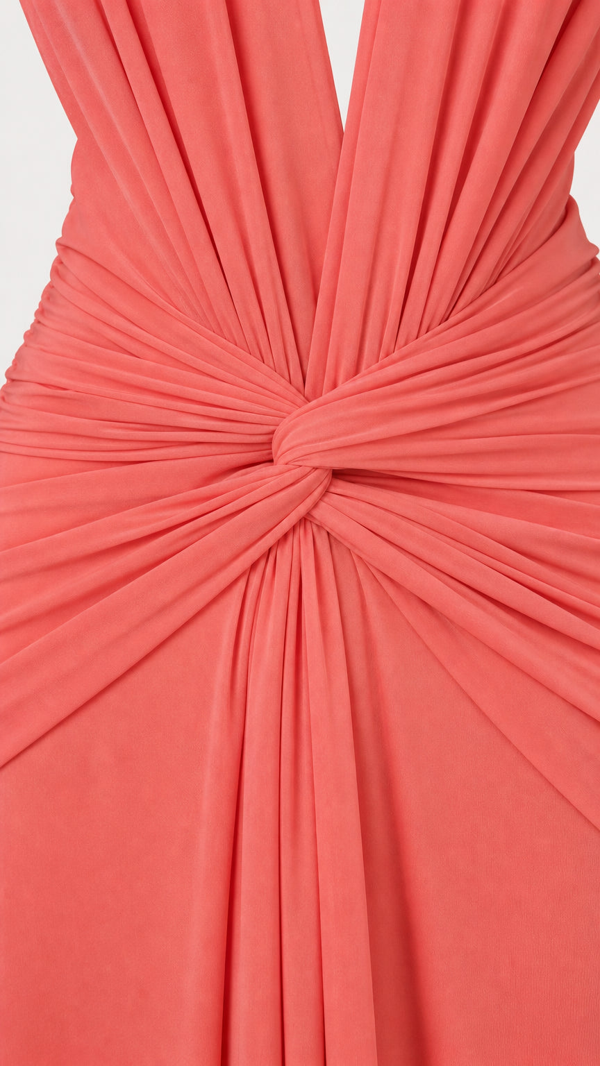 Close up of knot ruching detail on coral plunge maxi dress