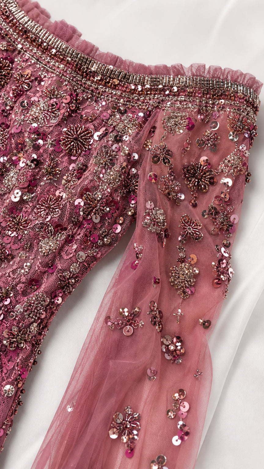 Close-up detail of sequin and bead embroidery on Dusty Rose fabric