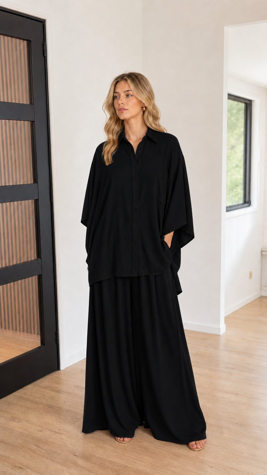 Black women's two-piece wide-leg pants set with collared dolman top