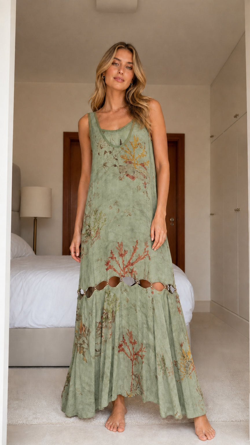 Model wearing sage green boho floral print cutout maxi dress