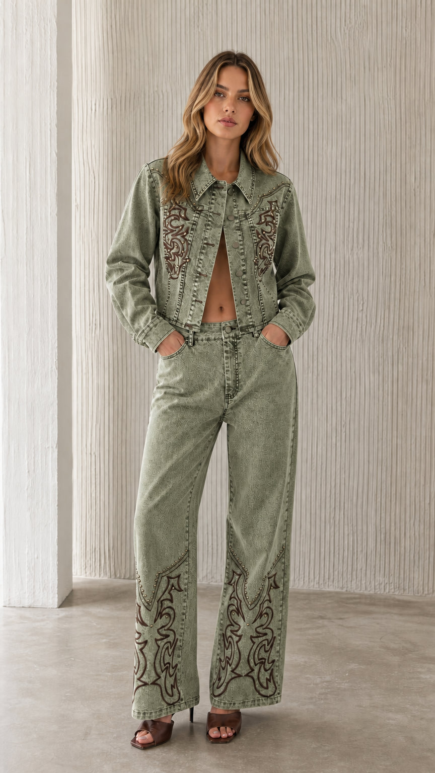 Full view of model wearing sage green embroidered denim set
