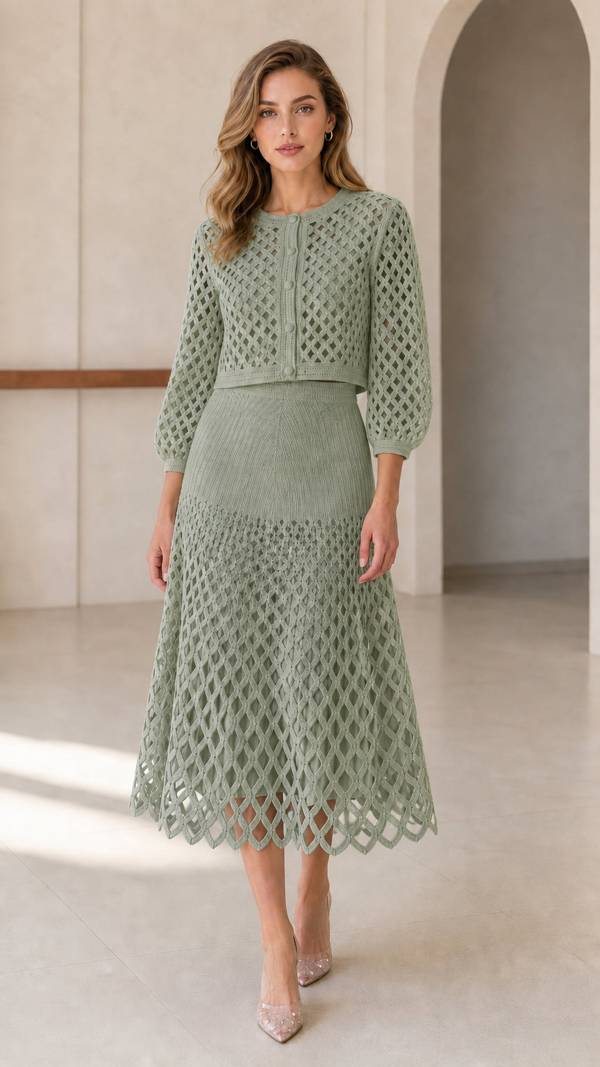 Model wearing sage green open-knit cardigan and midi skirt set