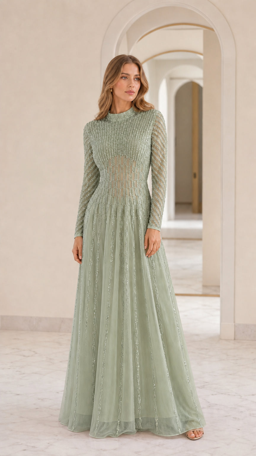 Front view of model wearing sage green sequin long sleeve maxi dress