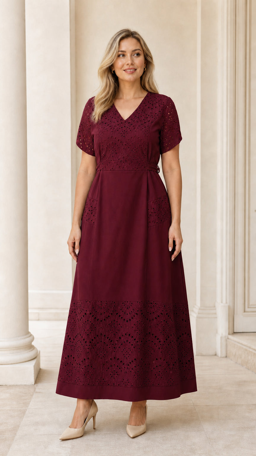 Full-length view of woman wearing burgundy wine red eyelet embroidered maxi dress
