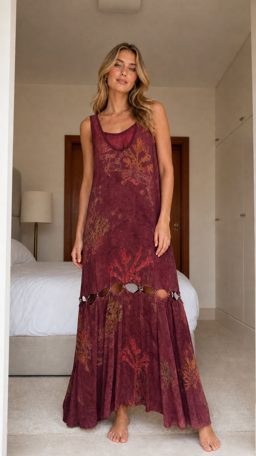 Model wearing burgundy boho floral print cutout maxi dress